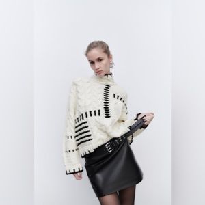 Knit Sweater with Contrasting Topstitching